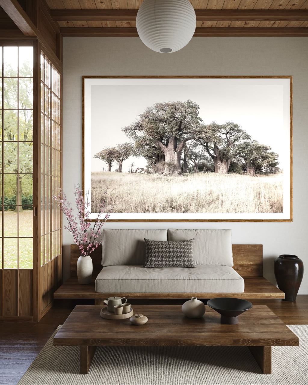 Modern interior featuring a framed artwork of a Large tree in a grassy field with a clear skyby Francoise V Fine Art Gallery in Cape Town, South Africa