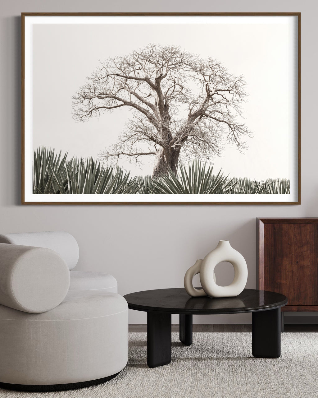 Modern interior featuring a framed artwork of a Large tree in a field with a clear skyby Francoise V Fine Art Gallery in Cape Town, South Africa
