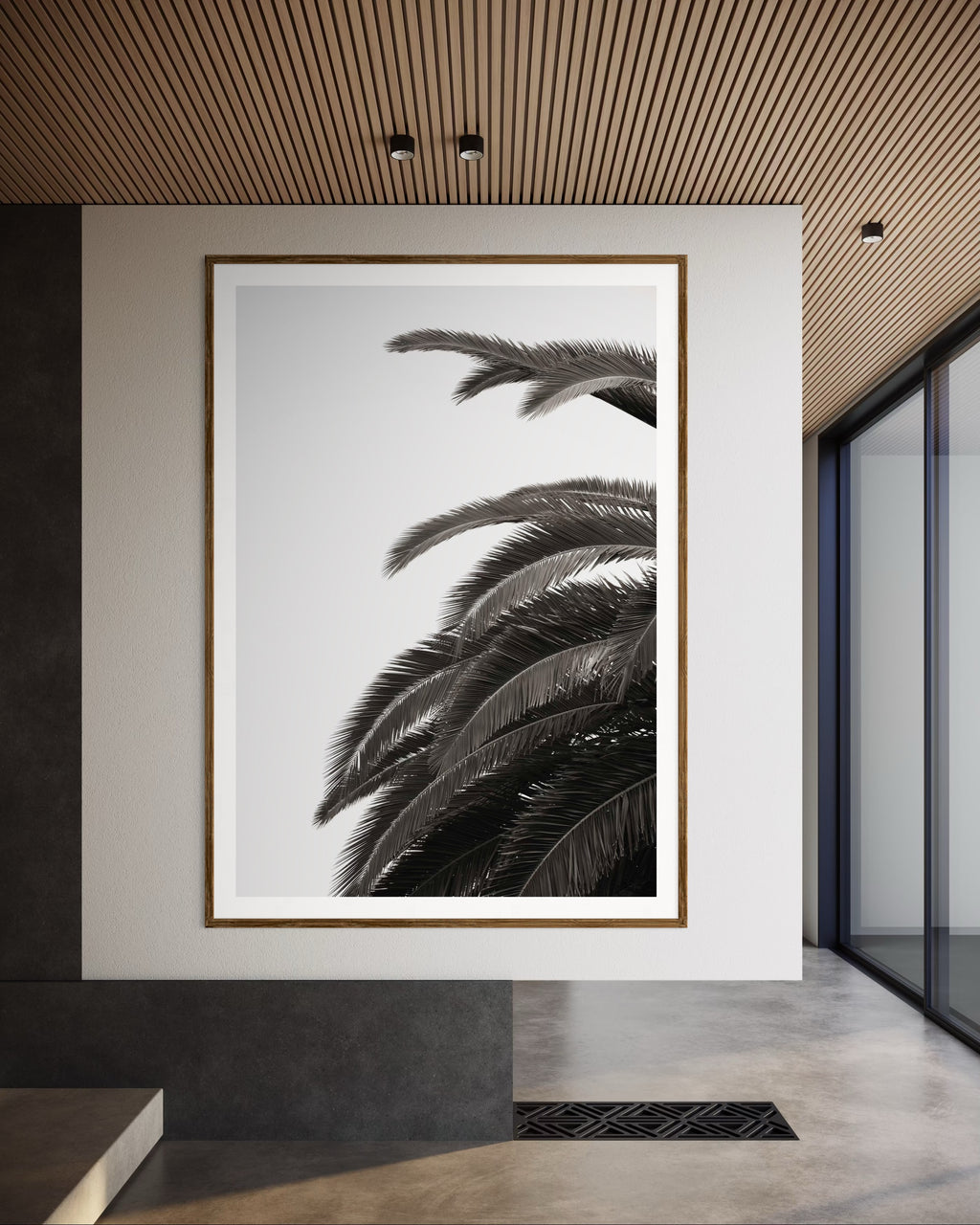 Modern interior featuring a framed artwork of palm leaves by Francoise V Fine Art Gallery in Cape Town, South Africa