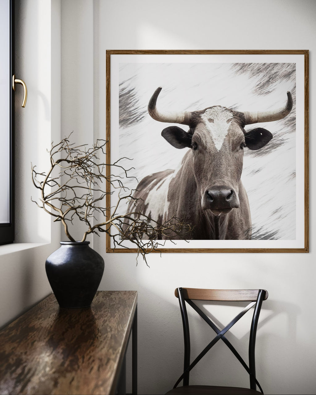 Modern interior featuring a framed artwork of a portrait of an Nguni cow by Francoise V Fine Art Gallery in Cape Town, South Africa