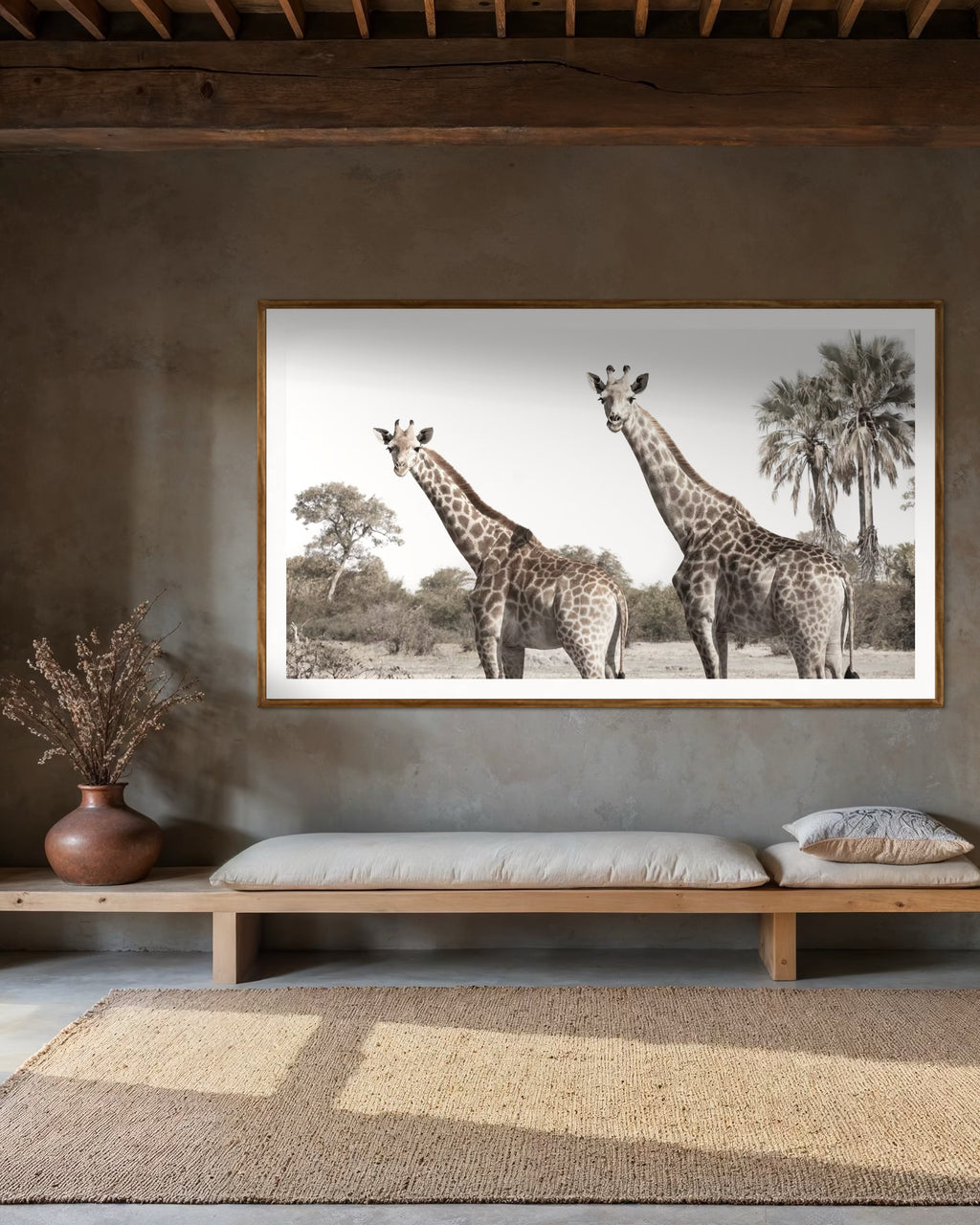 Modern interior featuring a framed artwork of a portrait of two giraffes by Francoise V Fine Art Gallery in Cape Town, South Africa