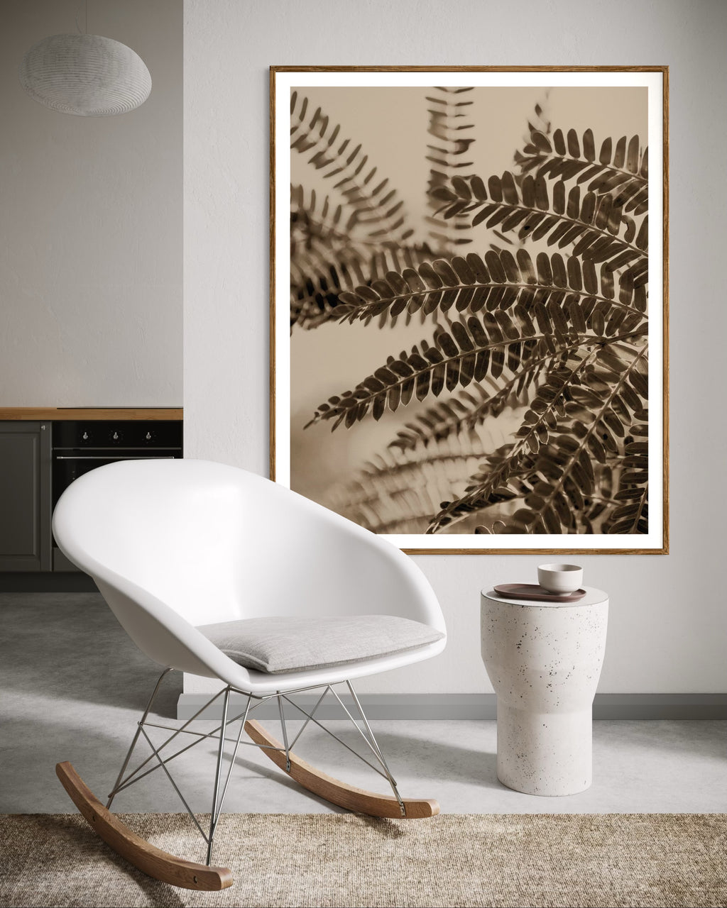 Modern interior featuring a framed artwork print of a close-up of acacia leaves with a sepia tone by Francoise V Fine Art Gallery in Cape Town, South Africa.