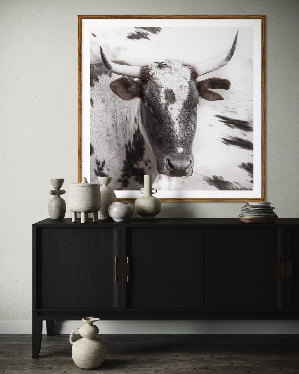 Modern interior featuring a framed artwork of a portrait of an Nguni cow by Francoise V Fine Art Gallery in Cape Town, South Africa