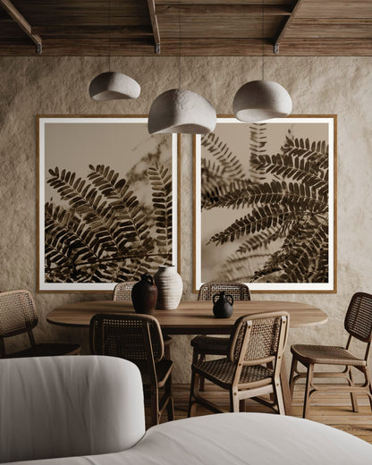 Dining interior with framed acacia leaves artworks on the wall by Francoise V Fine Art Gallery in Cape Town, South Africa.