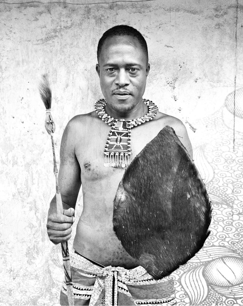 Artwork print of a Black and white portrait of a man holding a shield and spear against a textured wall by Francoise V Fine Art Gallery in Cape Town, South Africa