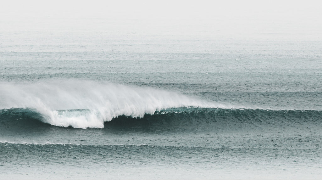 Artwork print of a photo of a Wave in the ocean with a foggy background by Francoise V Fine Art Gallery in Cape Town, South Africa